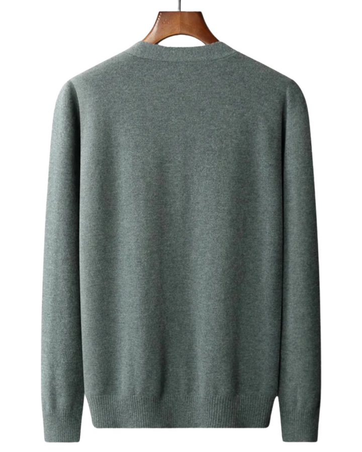 "Cardigan en laine mérinos tricoté Faunus" can be rewritten as "Cardigan en laine mérinos tricoté modèle Faunus".